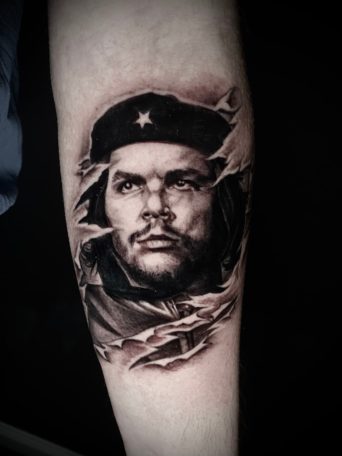 Black and grey portrait tattoo